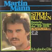 Strohblumen  ----- Martin Mann ----- 
Martin Mann ist ein deutscher Schlagersnger welcher im Jahr 1981 am deutschen Vorentscheid zum Eurovision Song Contest teilgenommen und mit dem Titel "Boogie Woogie" dort den 3. Platz erreichte.<br>
Der Song "Strohblumen" aus dem Jahr 1977 ist eine Coverversion des Liedes "Sunflower" und hat es bis auf den 41. Platz der Charts geschafft.<br>
Andere Songs von Martin Mann waren
"Cecilia" ,
"Meilenweit" ,
"Heut Ist Mir Alles Egal" und natrlich
"Memories"!<br>
Martin Mann war aber nicht nur als Snger sondern auch als Komponist beispielsweise fr die Flippers, Chris Roberts, Roberto Blanco, Nicole, Michael Holm, Jrgen Marcus, Wind, Roland Kaiser, Rex Gildo, Wencke Myhre und auch Tony Marshall aktiv !<br>
Fr seine Aktivitten hat Martin Mann Auszeichnungen wie eine Platin- und eine Goldene Schallplatte erhalten.<br>
