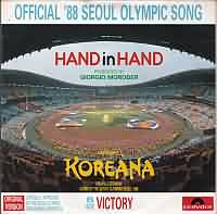 Hand in Hand ----- Koreana ----- 
"Hand in Hand" war der offizielle Song zu den olypmischen Sommerspielen 1988 und wurde von der koreanischen Musikgruppe "Koreana" vorgetragen.<br>
Das Lied hat es in Deutschland, der Schweiz und in Norwegen bis auf den ersten Platz der Charts geschafft.<br>
Ein weiterer Charterfolg zwei Jahre spter, jedoch nur in der Schweiz, war der Song "Living For Love"
